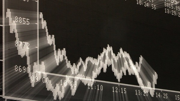 FRANKFURT AM MAIN, GERMANY - FEBRUARY 11: A trader looks up at the board displaying the day's course of the DAX stock market index at the Frankfurt Stock Exchange on February 11, 2016 in Frankfurt, Germany. Stock markets across the globe have been exceptionally volatile in recent weeks as investors fear a global economic slowdown. (Photo by Hannelore Foerster/Getty Images)