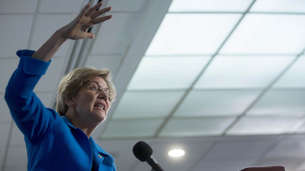 Senator Elizabeth Warren, a Democrat from Massachusetts, speaks during a Roosevelt Institute event at the National Press Club in Washington, D.C., U.S., on Tuesday, May 12, 2015. Warren, who says Wall Street recklessness caused the 2008 financial crisis, and New York Mayor Bill de Blasio, who is seeking to become a national leader for progressives, introduced a study by Joseph Stiglitz suggesting that new regulations could curb the flow of gains to the wealthiest and most powerful. Photographer: Andrew Harrer/Bloomberg *** Local Caption *** Elizabeth Warren