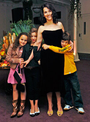 Nigella Lawson with children Cosima and Bruno (centre and right) and Saatchi’s daughter Phoebe (left)