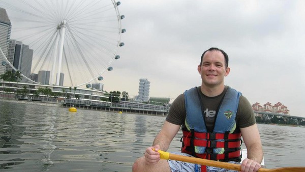 Shane Todd on a dragon boat in Singapore during an outing with friends and colleagues in 2011