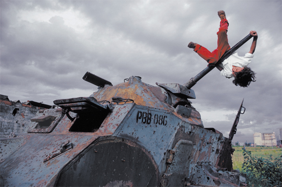 ‘Boy on Tank, Nicaragua’, 1984 by James Nachtwey