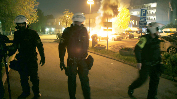 riot scene in stockholm, sweden